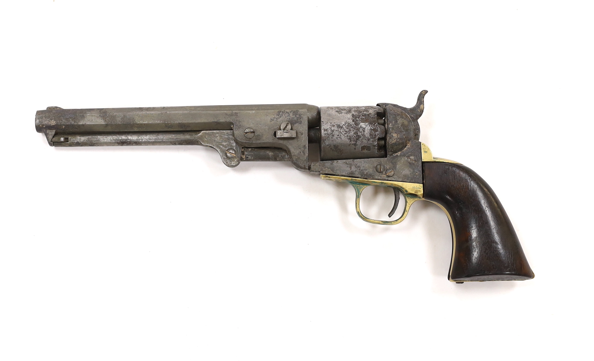 A six shot .36” Colt Navy percussion revolver number 200761 (matching) regulation underlever rammer, brass grip strap and trigger guard, pitted and worn overall